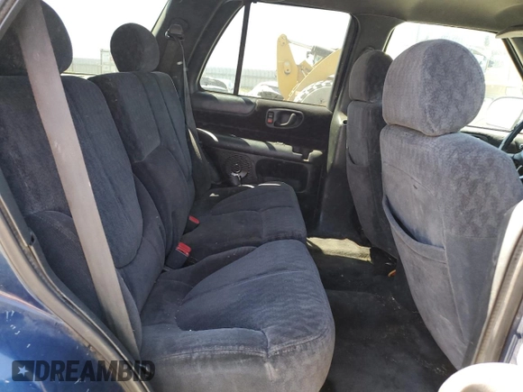 2001 GMC Jimmy SLE Rental Fleet z VIN 1GKDT13W212108144, wystawiony jako Copart lot #58753865 z przebiegiem 254 402 mil mil oraz Szkoda całkowita • Salvage title. Historia ofert i sprzedaży dostępna na DreamBid. Obrazek 11.