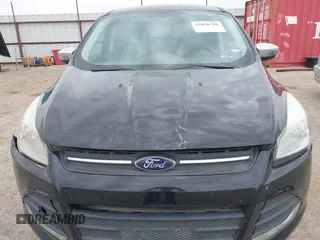 2015 Ford Escape SE with VIN 1FMCU9G90FUA54163, listed as a IAAI auction lot 42058788 with 130,623 mi miles. Bid and sale history available at carsss.com. Image 6.