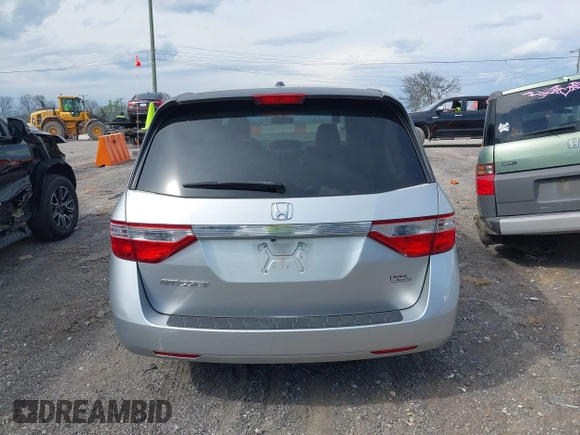 2012 Honda Odyssey EX-L with VIN 5FNRL5H68CB131431, listed as a IAAI auction lot 42012749 with 245,649 mi miles and . Bid and sale history available at carsss.com. Image 16.