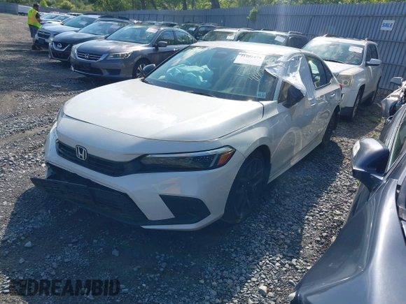 2023 Honda Civic Sport with VIN 2HGFE2F54PH512362, listed as a IAAI auction lot 41401479 with 12,672 mi miles and . Bid and sale history available at DreamBid. Image 2.