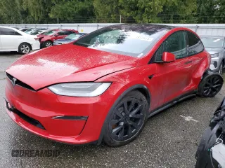 2022 Tesla Model X Plaid with VIN 7SAXCBE62NF339191, listed as a Copart auction lot 49349455 with 31,684 mi miles and Salvage Title. Bid and sale history available at DreamBid. Image 1.