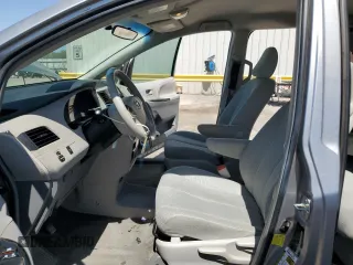 2012 Toyota Sienna with VIN 5TDZK3DC8CS246285, listed as a Copart auction lot 61676185 with 114,700 mi miles and Salvage title. Bid and sale history available at DreamBid. Image 7.