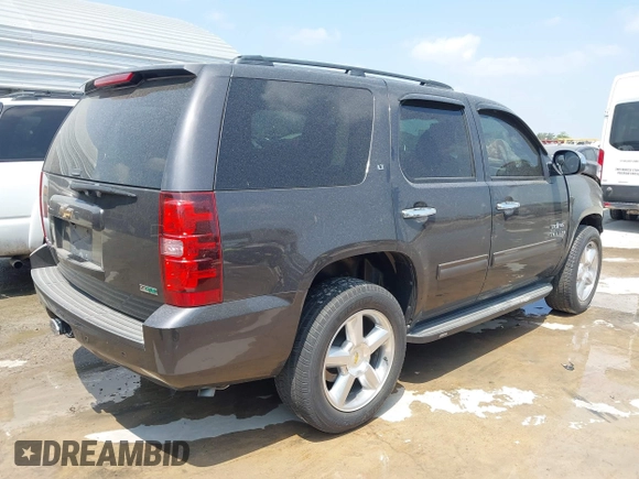 2010 Chevrolet Tahoe LS with VIN 1GNUCAE02AR290222, listed as a IAAI auction lot 42321824 with 188,926 mi miles and . Bid and sale history available at DreamBid. Image 4.