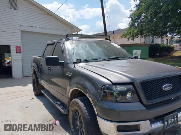 2004 Ford F-150 XLT with VIN 1FTRW14W54KC03745, listed as a IAAI auction lot 42726871 with 267,390 mi miles and . Bid and sale history available at DreamBid. Image 1.