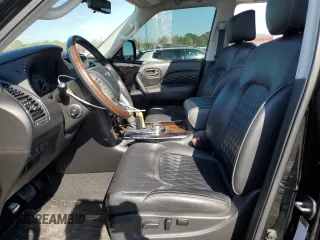 2018 Infiniti QX80 with VIN JN8AZ2NE1J9194002, listed as a Copart auction lot 50232765 with 76,395 mi miles and Salvage title. Bid and sale history available at DreamBid. Image 7.