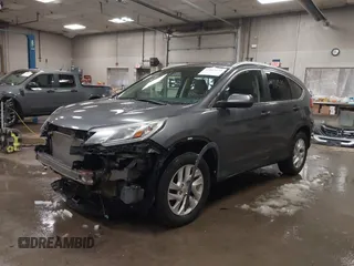 2015 Honda CR-V EX-L with VIN 2HKRM4H75FH604059, listed as a IAAI auction lot 41869535 with 131,848 mi miles. Bid and sale history available at carsss.com. Image 2.