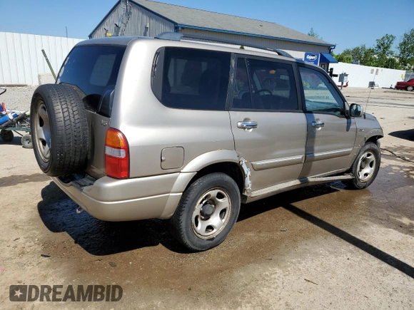 2002 Suzuki XL7 Standard z VIN JS3TY92V524108548, wystawiony jako Copart lot #56304705 z przebiegiem 288 201 mil mil oraz Nie do naprawy • Non repairable. Historia ofert i sprzedaży dostępna na DreamBid. Obrazek 3.