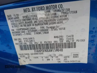 2010 Ford Focus SE with VIN 1FAHP3FNXAW159048, listed as a IAAI auction lot 42103062 with 142,810 mi miles. Bid and sale history available at carsss.com. Image 9.