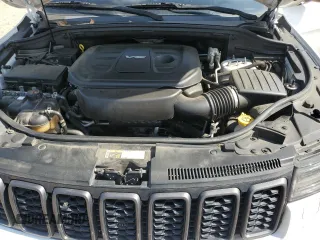 2018 Jeep Grand Cherokee High Altitude with VIN 1C4RJECG1JC260482, listed as a Copart auction lot 57310115 with 144,320 mi miles and Salvage title. Bid and sale history available at DreamBid. Image 12.