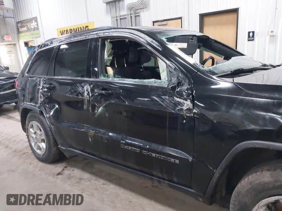 2017 Jeep Grand Cherokee Laredo with VIN 1C4RJFAG2HC625111, listed as a IAAI auction lot 42044571 with 148,533 mi miles and . Bid and sale history available at DreamBid. Image 6.