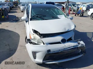 2014 Toyota Prius Four z VIN JTDKN3DU9E1755013, wystawiony jako IAAI lot #42228158 z przebiegiem 136 391 mil mil oraz . Historia ofert i sprzedaży dostępna na DreamBid. Obrazek 6.