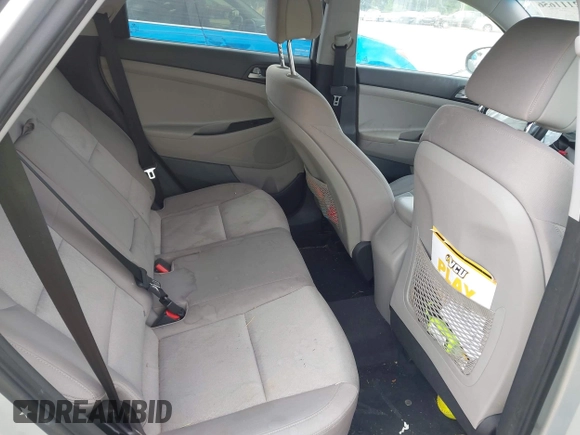 2016 Hyundai Tucson SE z VIN KM8J33A48GU116852, wystawiony jako IAAI lot #42111656 z przebiegiem 138 656 mil mil oraz . Historia ofert i sprzedaży dostępna na DreamBid. Obrazek 8.