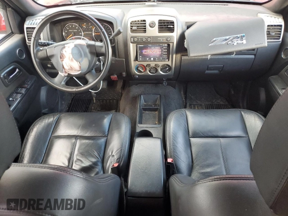 2011 GMC Canyon SLT with VIN 1GTH6NFP1B8113219, listed as a Copart auction lot 80649194 with 120,979 mi miles and Salvage Title. Bid and sale history available at carsss.com. Image 8.