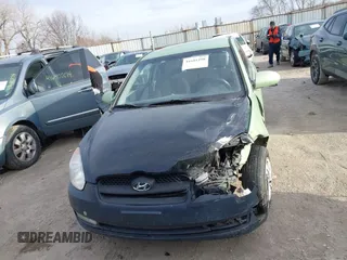 2009 Hyundai Accent Auto SE with VIN KMHCN36C69U112207, listed as a IAAI auction lot 41641298 with 166,804 mi miles. Bid and sale history available at carsss.com. Image 12.