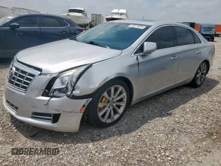 2013 Cadillac XTS Luxury z VIN 2G61P5S30D9122912, wystawiony jako Copart lot #56970895 z przebiegiem 189 310 mil mil oraz Szkoda całkowita • Salvage title. Historia ofert i sprzedaży dostępna na DreamBid. Obrazek 1.