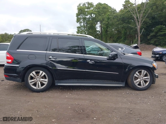 2011 Mercedes-Benz GL-Class GL 450 with VIN 4JGBF7BE6BA635581, listed as a IAAI auction lot 40401205 with 112,344 mi miles. Bid and sale history available at carsss.com. Image 13.