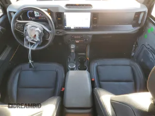 2023 Ford Bronco with VIN 1FMEE5DP8PLB93420, listed as a Copart auction lot 42247495 with 8,802 mi miles and Salvage Title. Bid and sale history available at DreamBid. Image 8.