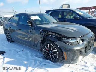 2023 BMW i4 M50 with VIN WBY33AW03PFN81310, listed as a IAAI auction lot 41387873 with 21,586 mi miles. Bid and sale history available at carsss.com. Image 1.