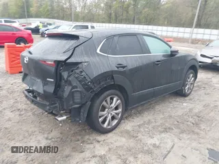 2020 Mazda CX-30 Select with VIN 3MVDMBCL3LM104988, listed as a IAAI auction lot 41951565 with 53,685 mi miles and . Bid and sale history available at DreamBid. Image 4.