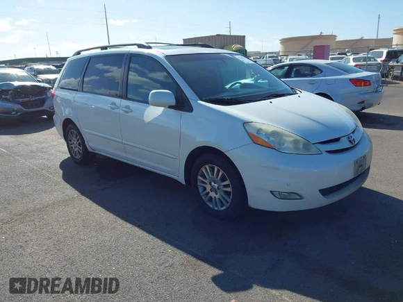 2010 Toyota Sienna XLE with VIN 5TDYK4CC3AS336590, listed as a IAAI auction lot 41798194 with 230,707 mi miles. Bid and sale history available at carsss.com. Image 1.