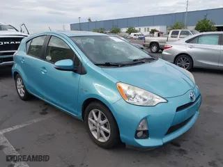 2013 Toyota Prius c One with VIN JTDKDTB33D1055466, listed as a IAAI auction lot 39803165 with 173,123 mi miles. Bid and sale history available at carsss.com. Image 1.