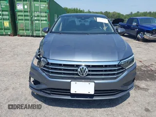 2019 Volkswagen Jetta SEL z VIN 3VWE57BU0KM110267, wystawiony jako IAAI lot #42161272 z przebiegiem 63 955 mil mil oraz . Historia ofert i sprzedaży dostępna na DreamBid. Obrazek 12.