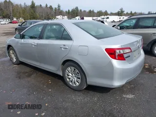 2014 Toyota Camry L with VIN 4T4BF1FK3ER425879, listed as a IAAI auction lot 41772525 with 180,910 mi miles. Bid and sale history available at carsss.com. Image 3.