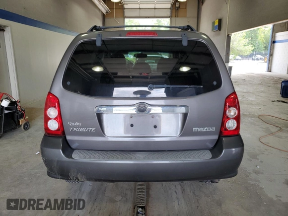 2005 Mazda Tribute S with VIN 4F2CZ96115KM59847, listed as a Copart auction lot 67740144 with 217,053 mi miles and Salvage Title. Bid and sale history available at carsss.com. Image 6.
