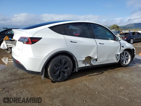 2023 Tesla Model Y Long Range with VIN 7SAYGDEEXPF844622, listed as a Copart auction lot 49094465 with 35,191 mi miles and Salvage Title. Bid and sale history available at DreamBid. Image 3.