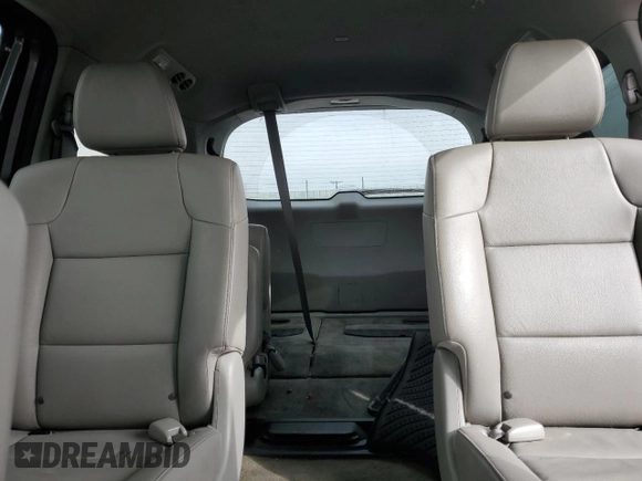 2014 Honda Odyssey Touring z VIN 5FNRL5H91EB121062, wystawiony jako Copart lot #53546515 z przebiegiem 192 136 mil mil oraz Szkoda całkowita • Salvage title. Historia ofert i sprzedaży dostępna na DreamBid. Obrazek 10.