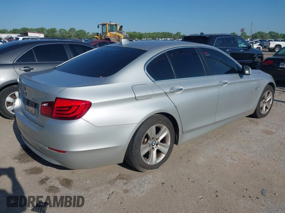 2013 BMW 5 Series 528i xDrive with VIN WBAXH5C5XDD114174, listed as a IAAI auction lot 41934972 with 127,193 mi miles. Bid and sale history available at carsss.com. Image 4.