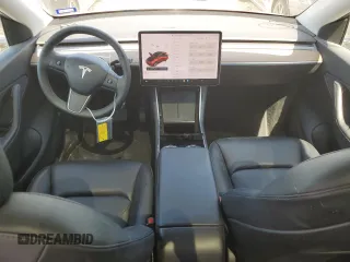 2021 Tesla Model Y Standard Range with VIN 5YJYGDED5MF116562, listed as a Copart auction lot 51211535 with 68,549 mi miles and Salvage Title. Bid and sale history available at DreamBid. Image 8.