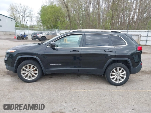 2015 Jeep Cherokee Limited with VIN 1C4PJMDB9FW680565, listed as a IAAI auction lot 42134052 with 192,728 mi miles. Bid and sale history available at carsss.com. Image 14.