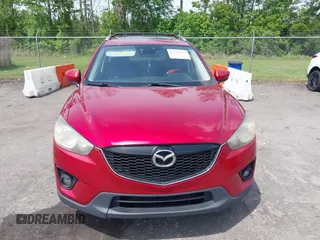 2014 Mazda CX-5 Grand Touring with VIN JM3KE2DY3E0382920, listed as a IAAI auction lot 42102876 with 324,608 mi miles. Bid and sale history available at carsss.com. Image 12.