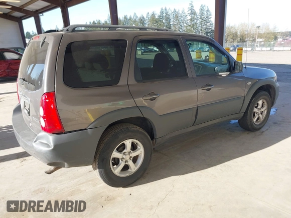 2006 Mazda Tribute i with VIN 4F2YZ02Z26KM12180, listed as a IAAI auction lot 41959606 with 228,217 mi miles and . Bid and sale history available at DreamBid. Image 4.