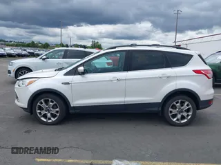 2013 Ford Escape SEL с VIN 1FMCU9H99DUC62280, выставлен на аукционе IAAI как лот 42430435 с пробегом 112 411 миль миль и . История ставок и продаж доступна на DreamBid. Изображение 14.