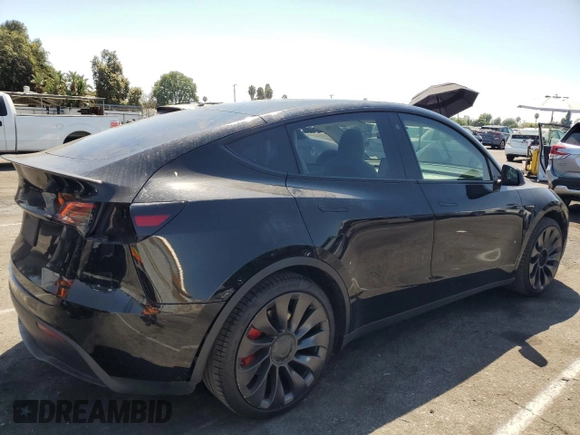 2022 Tesla Model Y Performance with VIN 7SAYGDEF4NF436834, listed as a Copart auction lot 68992234 with 22,171 mi miles and Salvage title. Bid and sale history available at DreamBid. Image 3.
