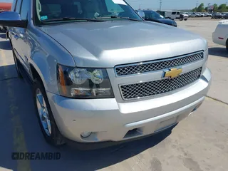 2013 Chevrolet Tahoe LT with VIN 1GNSCBE07DR164486, listed as a IAAI auction lot 42216421 with 220,395 mi miles and . Bid and sale history available at DreamBid. Image 6.