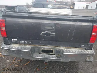 2014 Chevrolet Silverado 1500 LT with VIN 1GCRCRECXEZ297304, listed as a IAAI auction lot 40954344 with 185,323 mi miles. Bid and sale history available at carsss.com. Image 16.