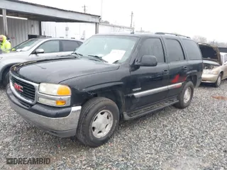 2005 GMC Yukon SLT with VIN 1GKEC13T85J181539, listed as a IAAI auction lot 41872071 with 1 mi miles. Bid and sale history available at carsss.com. Image 2.