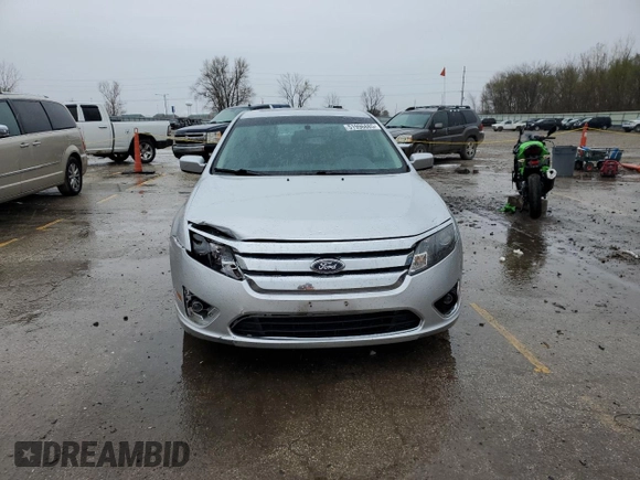 2012 Ford Fusion SEL z VIN 3FAHP0JA3CR156338, wystawiony jako Copart lot #51996885 z przebiegiem 162 892 mil mil oraz Szkoda całkowita • Salvage title. Historia ofert i sprzedaży dostępna na DreamBid. Obrazek 5.