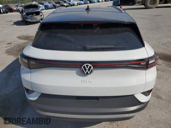 2021 Volkswagen ID.4 Pro S z VIN WVGKMPE22MP046499, wystawiony jako Copart lot #57947235 z przebiegiem 26 759 mil mil oraz Nie do naprawy • Non repairable. Historia ofert i sprzedaży dostępna na DreamBid. Obrazek 6.