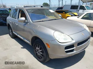 2005 Porsche Cayenne z VIN WP1AA29P55LA24408, wystawiony jako IAAI lot #42398234 z przebiegiem 237 890 mil mil oraz . Historia ofert i sprzedaży dostępna na DreamBid. Obrazek 1.