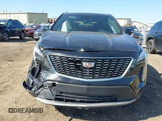2023 Cadillac XT4 AWD Premium Luxury with VIN 1GYFZDR46PF195391, listed as a IAAI auction lot 41848429 with 31,904 mi miles and . Bid and sale history available at carsss.com. Image 12.
