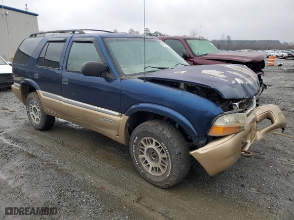 1999 GMC Jimmy SLE with VIN 1GKDT13W8X2545509, listed as a Copart auction lot 81608944 with 130,881 mi miles and Salvage Title. Bid and sale history available at carsss.com. Image 4.