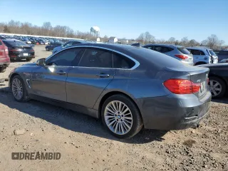2016 BMW 4 Series 428i xDrive with VIN WBA4C9C50GG137930, listed as a Copart auction lot 45417065 with 135,066 mi miles and Salvage Title. Bid and sale history available at DreamBid. Image 2.