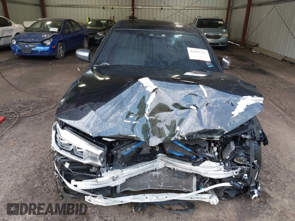 2018 BMW 5 Series M550i xDrive with VIN WBAJB9C51JB035949, listed as a IAAI auction lot 42085727 with Not provided miles and . Bid and sale history available at DreamBid. Image 11.