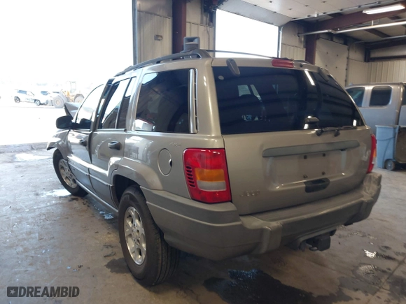 2001 Jeep Grand Cherokee Laredo with VIN 1J4GW48S01C732942, listed as a IAAI auction lot 41988918 with 205,752 mi miles. Bid and sale history available at carsss.com. Image 3.
