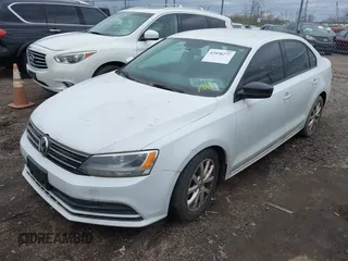 2015 Volkswagen Jetta Sedan 1.8T SE with VIN 3VWD17AJXFM324736, listed as a IAAI auction lot 42038277 with 151,817 mi miles. Bid and sale history available at carsss.com. Image 2.