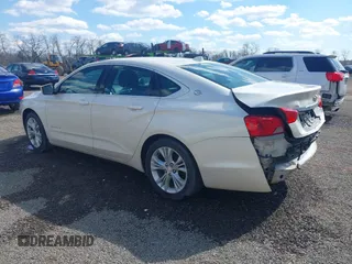 2014 Chevrolet Impala LT with VIN 1G1125S33EU101464, listed as a IAAI auction lot 41863521 with 215,270 mi miles and . Bid and sale history available at DreamBid. Image 3.